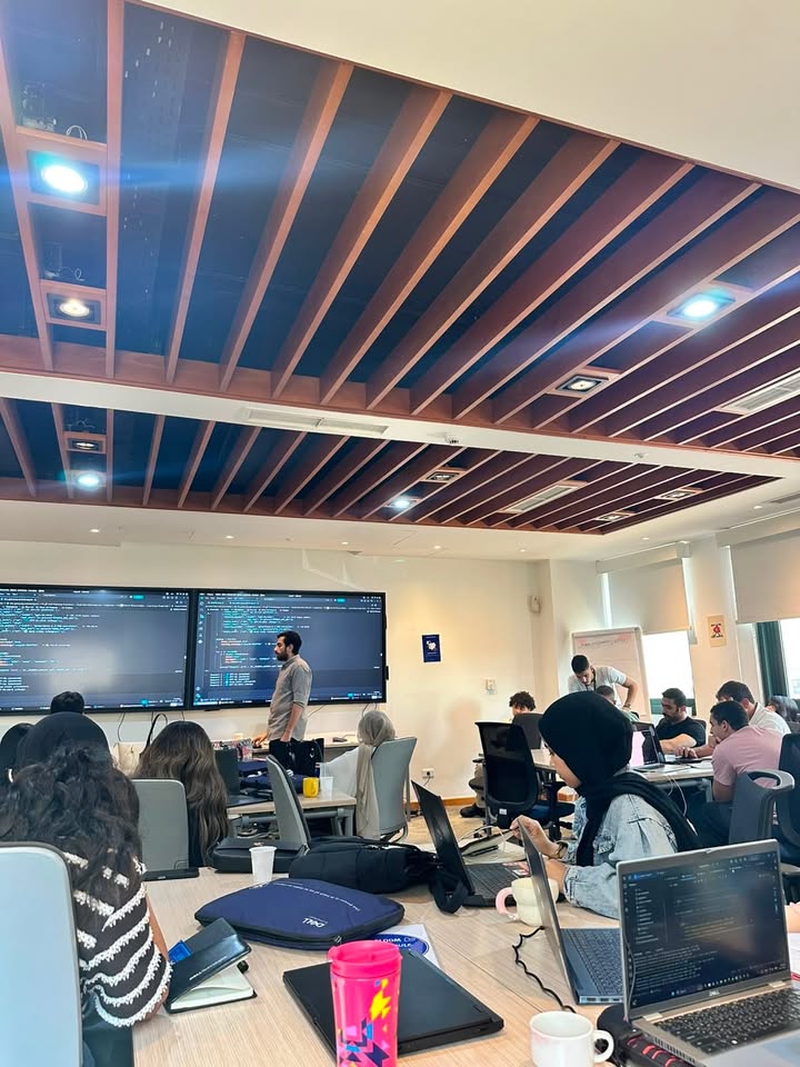 Presenting an AI/LLM session to Dell Summer Academy trainees in the training room